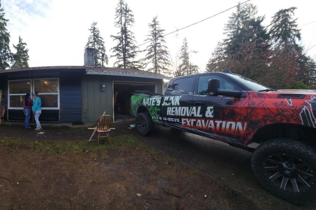 Nate’s Junk Removal & Excavation truck parked at an active residential job site in Washington State